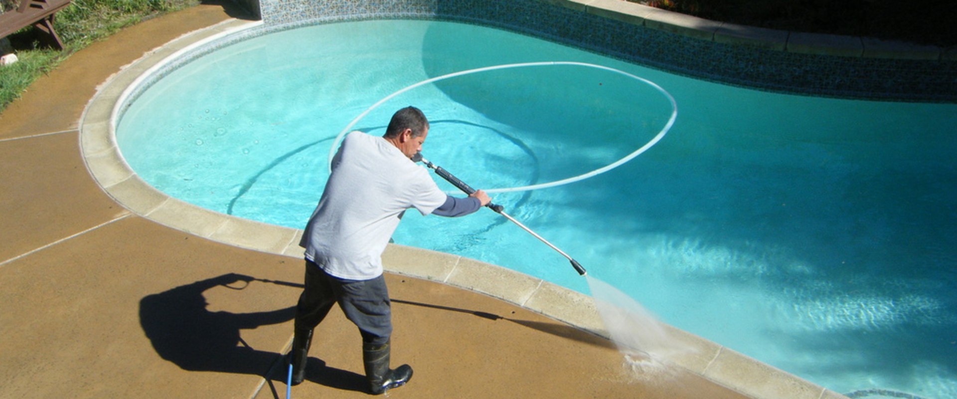 Cleaning the Pool Walls and Floor